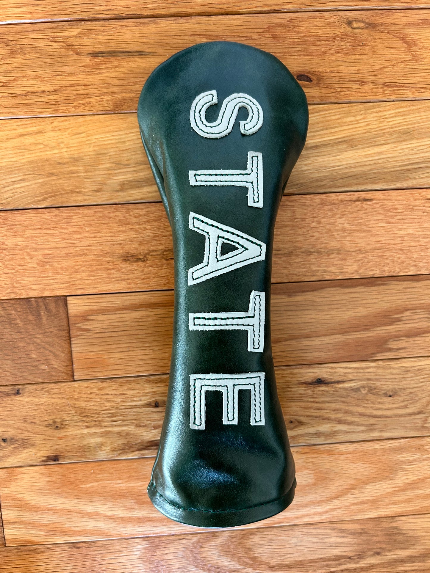 State wood head cover